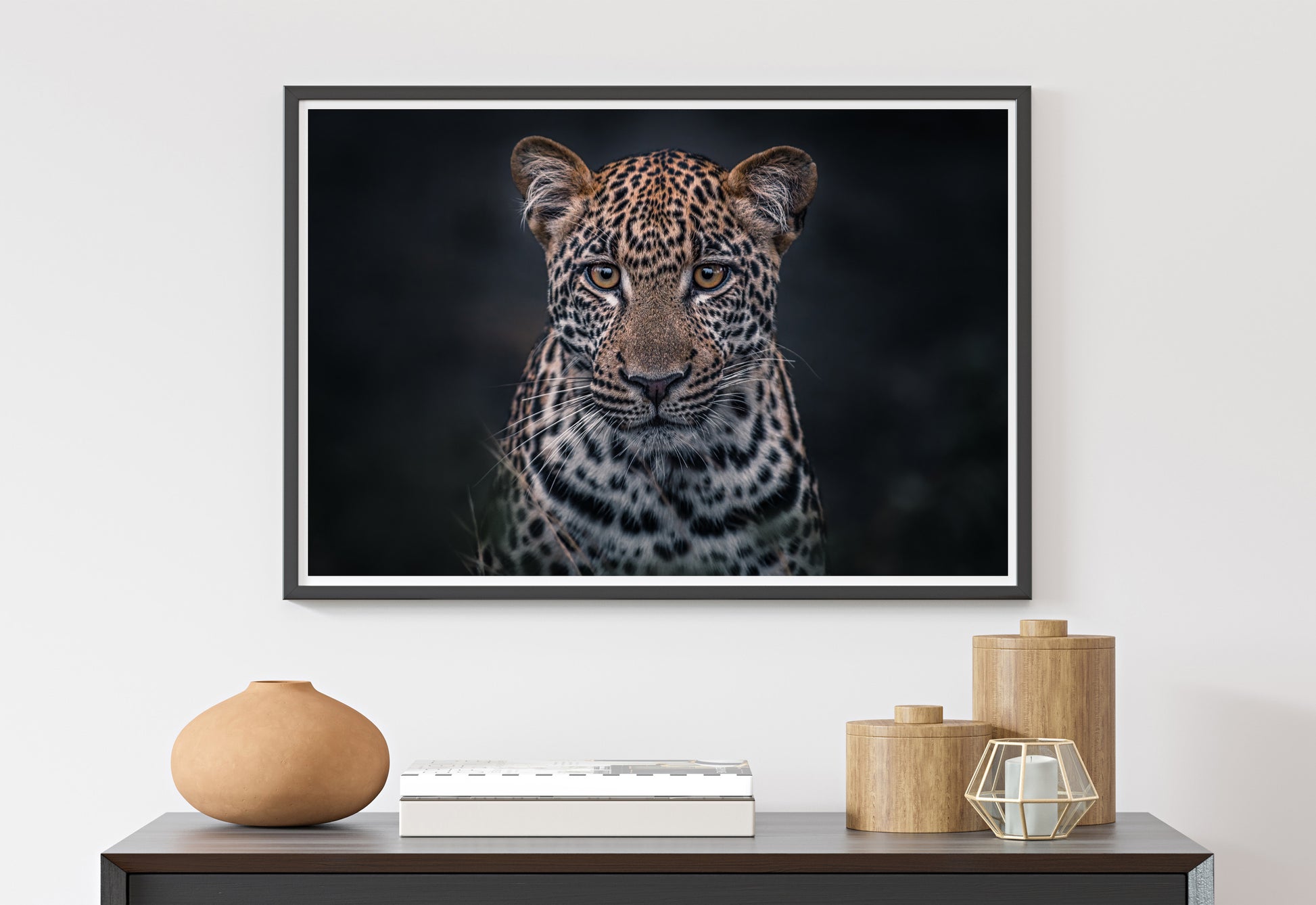 framed leopard print displayed on wall